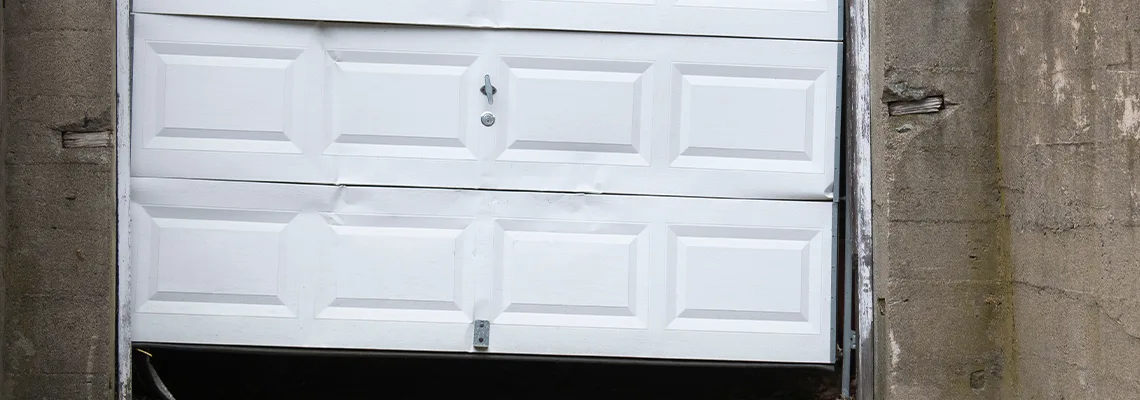 Garage Door Got Hit By A Car Dent Removal in Niagara Falls, ON
