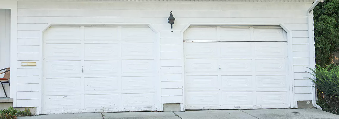 Roller Garage Door Dropped Down Replacement in Niagara Falls, ON